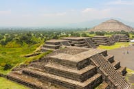 Explore the majestic pyramids of Teotihuacan from a bird's eye perspective, showcasing ancient architecture.