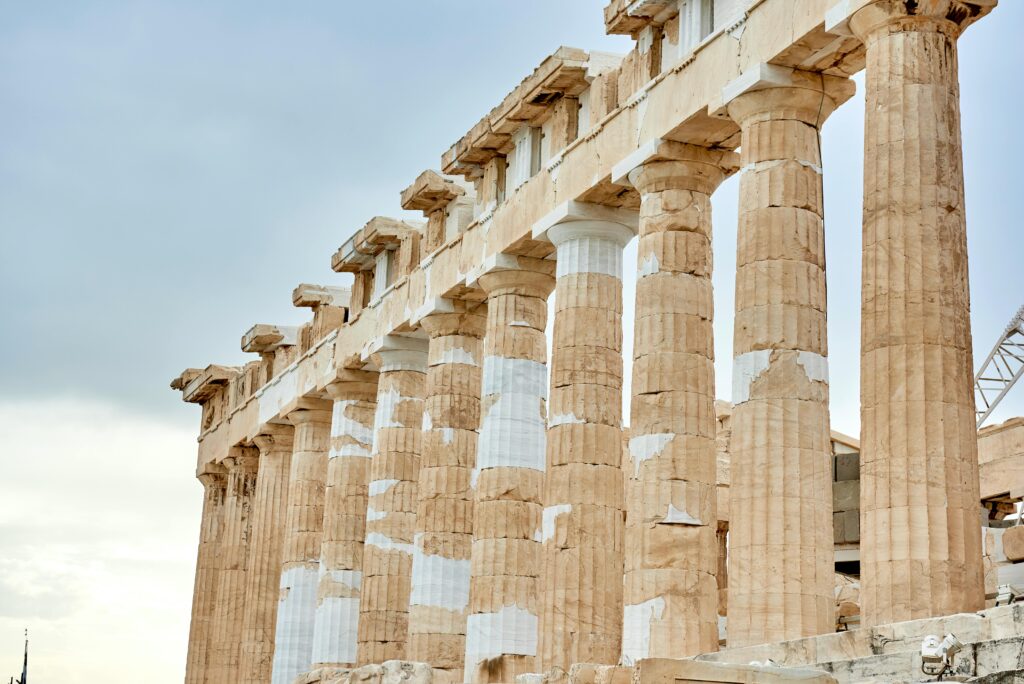 A striking view of the iconic Parthenon columns in Athens, showcasing ancient Greek architecture.