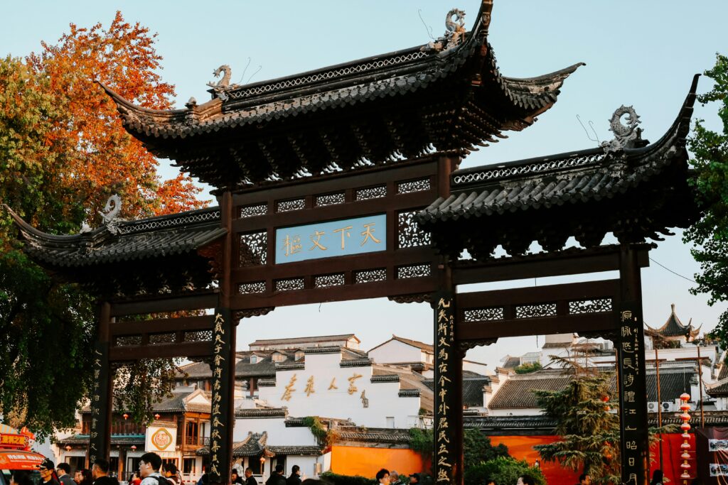 Explore the cultural heritage of Nanjing, China with this stunning autumn street scene.
